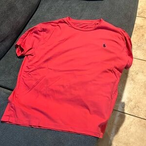 Mauve colored polo tee.